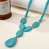 COLLAR BOHEMIO GÉOMÉTRIQUE LARME REDONDO TURQUESA PERLÉ