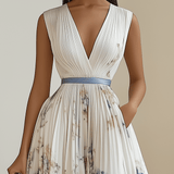 VESTIDO MIDI BLANCO FLORAL DE CORTE A SIN MANGAS