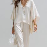 Minimalist Design Off-white Textured Suit With Batwing Sleeves.
