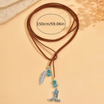 COLLAR VINTAGE BOHEMIO TURQUESA PLUMA COLGANTE SUPERPUESTO