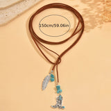 COLLAR VINTAGE BOHEMIO TURQUESA PLUMA COLGANTE SUPERPUESTO