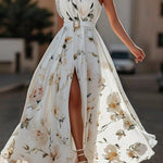 Vestido longo de chiffon verde claro com estampa floral, drapeado e um ombro só.