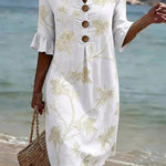 VESTIDO DE PLAYA CON BORDADO FLORAL – GRACIA RELAJADA