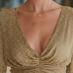 VESTIDO MINI DORADO BRILLANTE AJUSTADO CON FRUNCIDO Y ESCOTE EN V - VALERINA MARBELLA