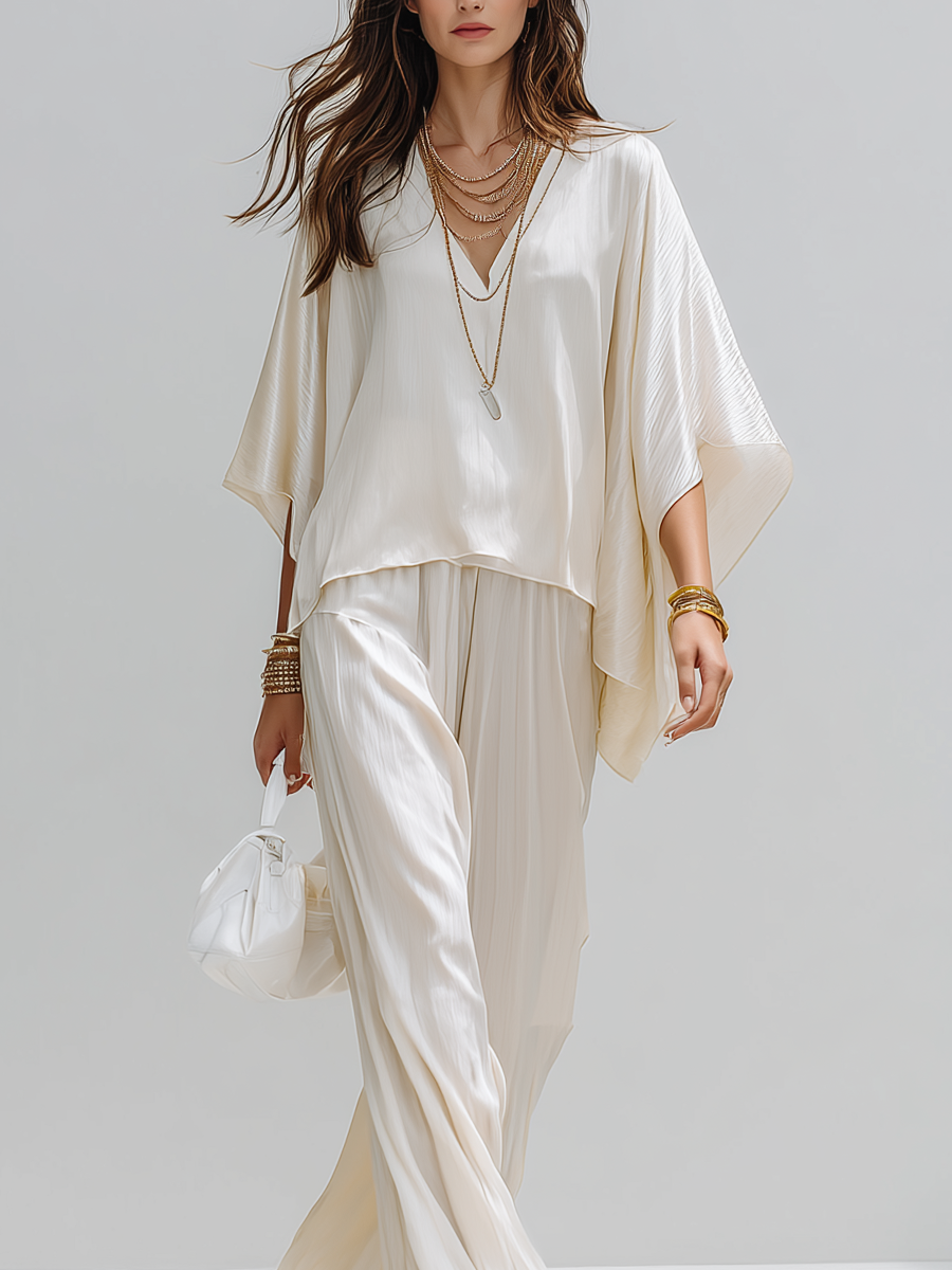 Minimalist Design Off-white Textured Suit With Batwing Sleeves.