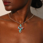 COLLAR BOHEMIO VIBRANT COLORÉ TURQUESA CRUZ COLGANTE