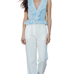 Fresh Light Blue Sleeveless Top With Ruffled Details Paired With White Wide-leg Pants.