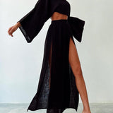 Conjunto casual de duas peças em algodão e linho com fenda elegante.