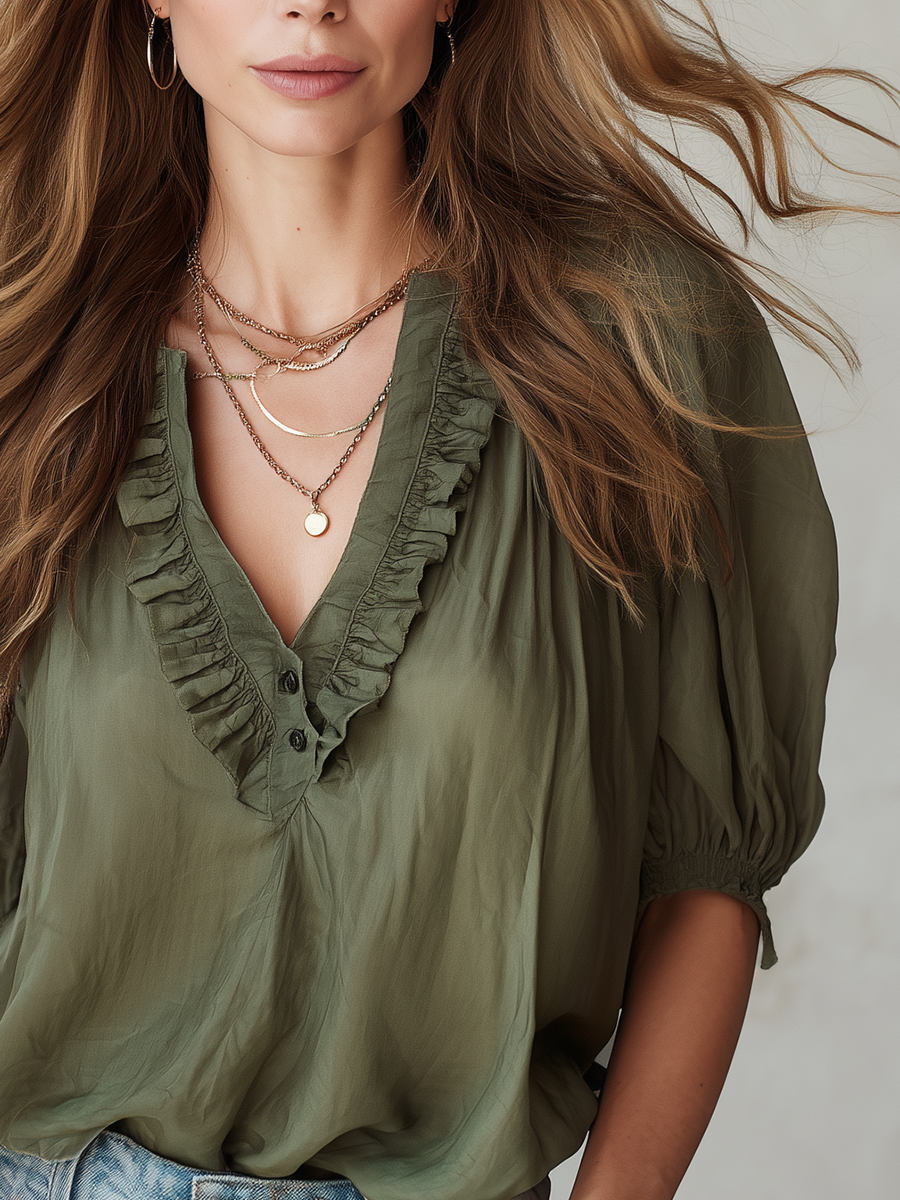 Military Green Top With Ruffled Details And Puff Sleeves.
