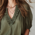 Military Green Top With Ruffled Details And Puff Sleeves.